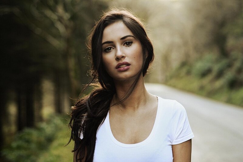woman in white t-shirt on road