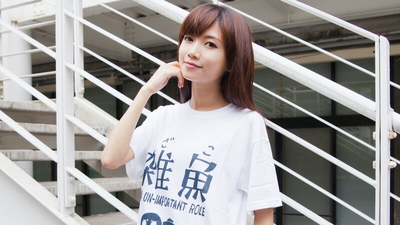 woman in white t-shirt with text