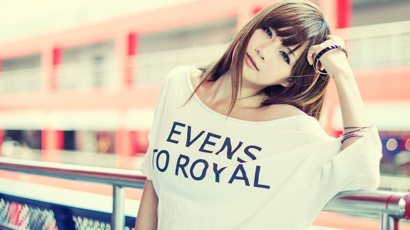 woman in white t-shirt with text