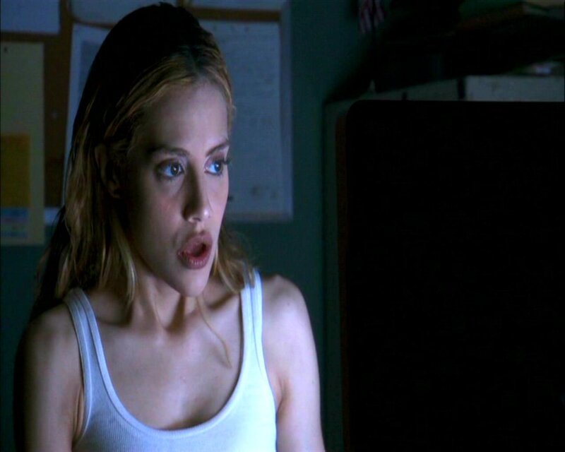 woman in white tank top