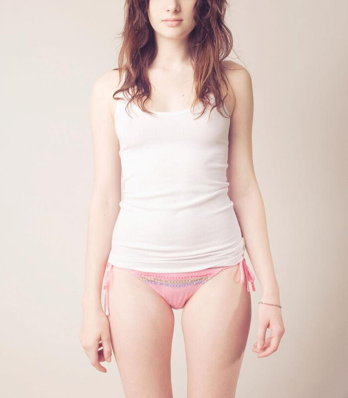 woman in white tank top