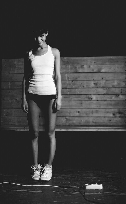 woman in white tank top