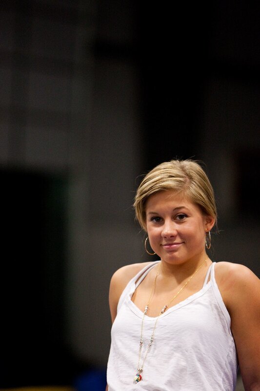 woman in white tank top