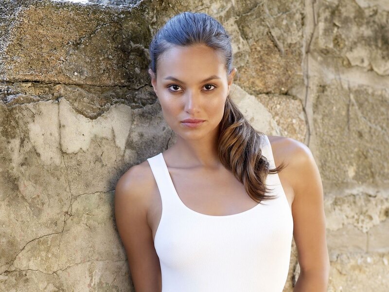 woman in white tank top