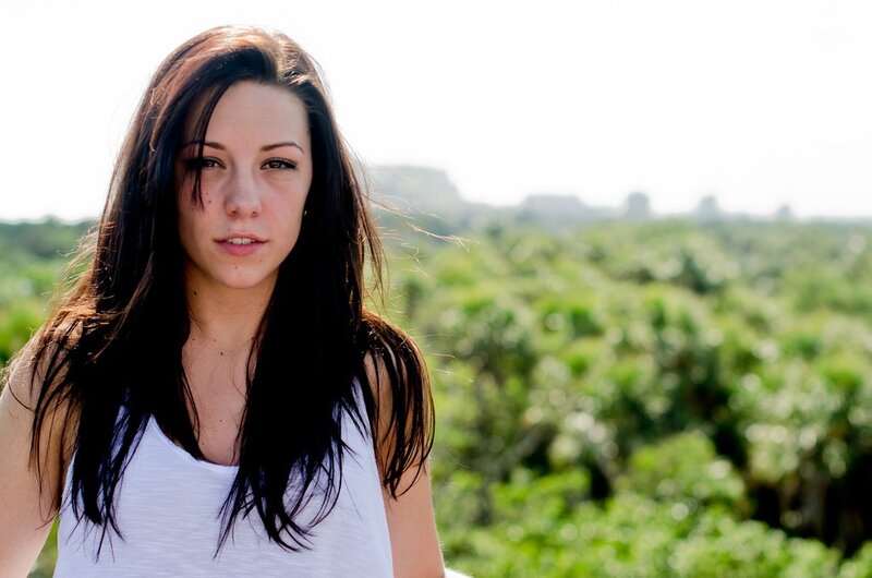 woman in white tank top
