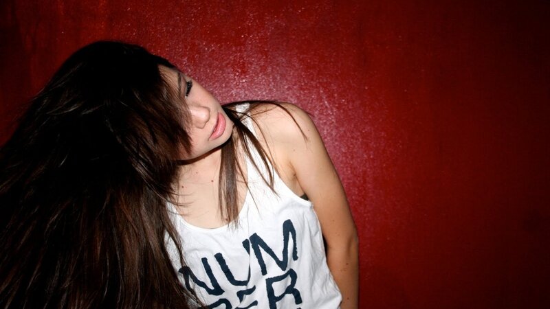 woman in white tank top