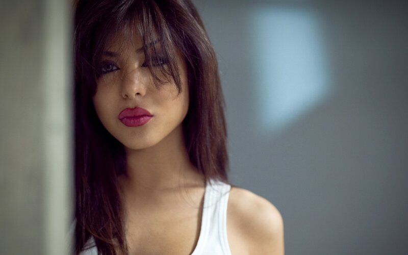 woman in white tank top