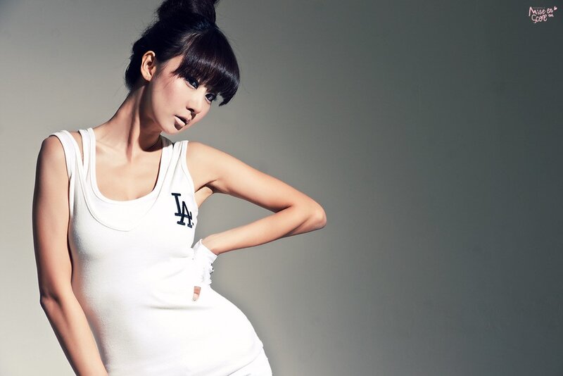 woman in white tank top