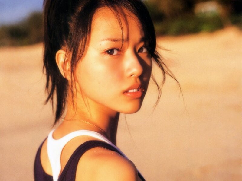 woman in white tank top