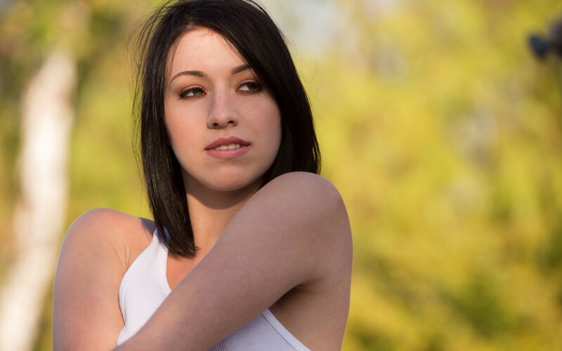 woman in white tank top