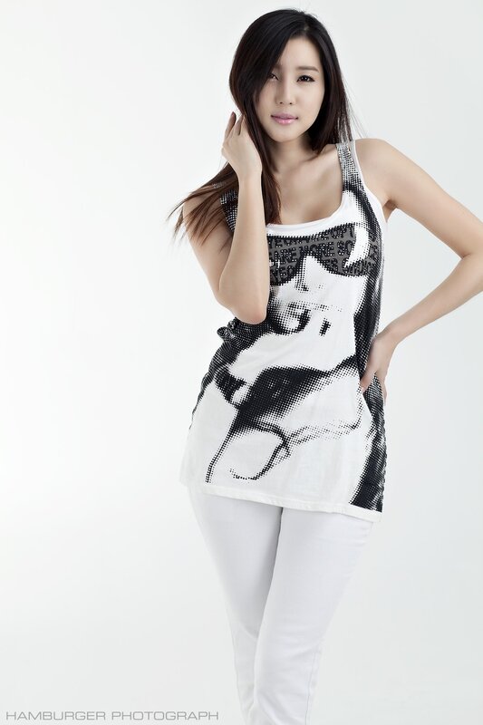 woman in white tank top