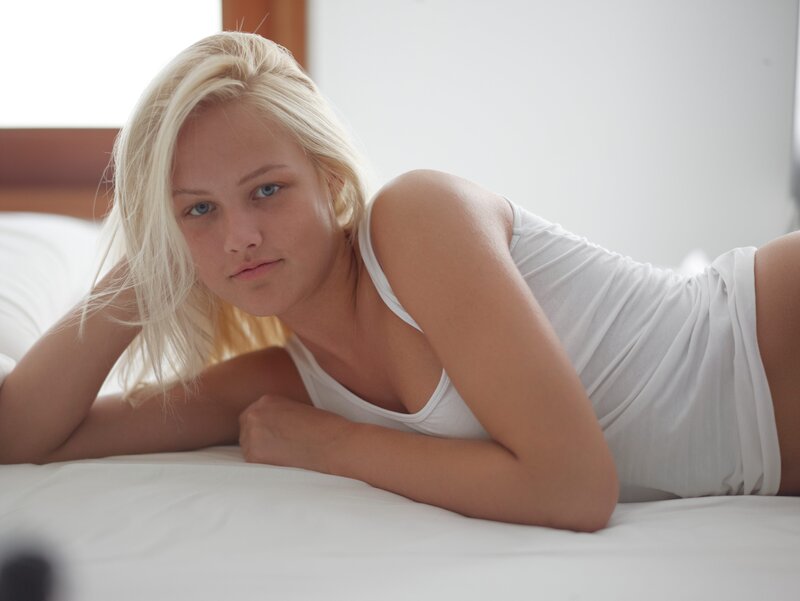 woman in white tank top