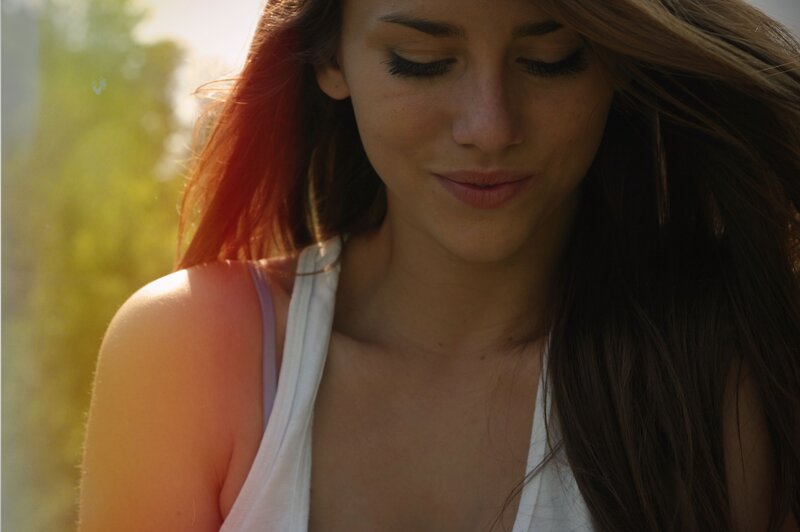 woman in white tank top
