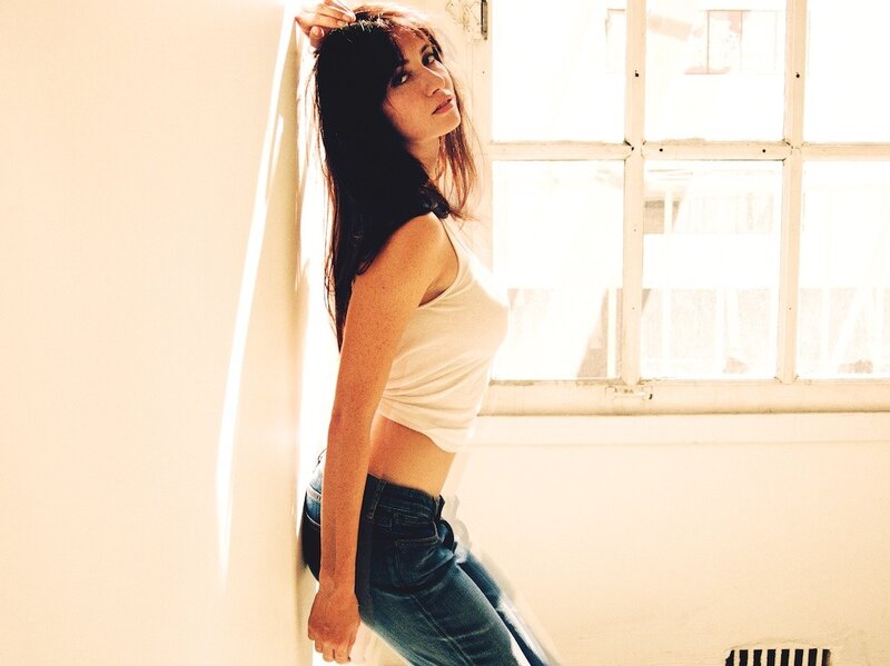 woman in white tank top