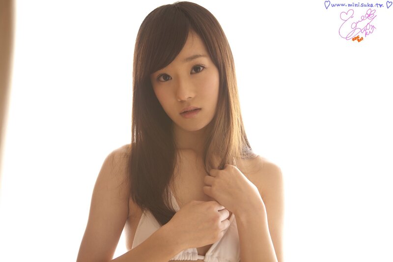 woman in white top