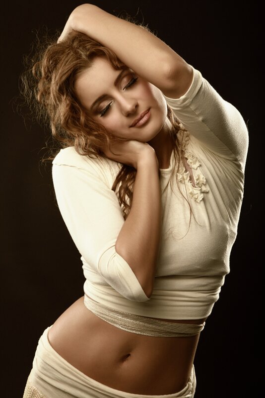woman in white top