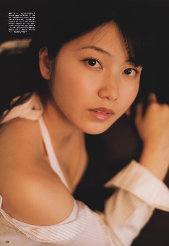 woman in white top