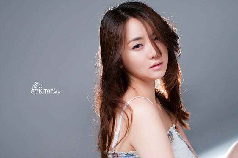 woman in white top