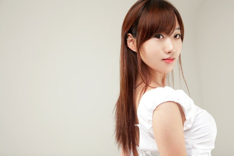 woman in white top