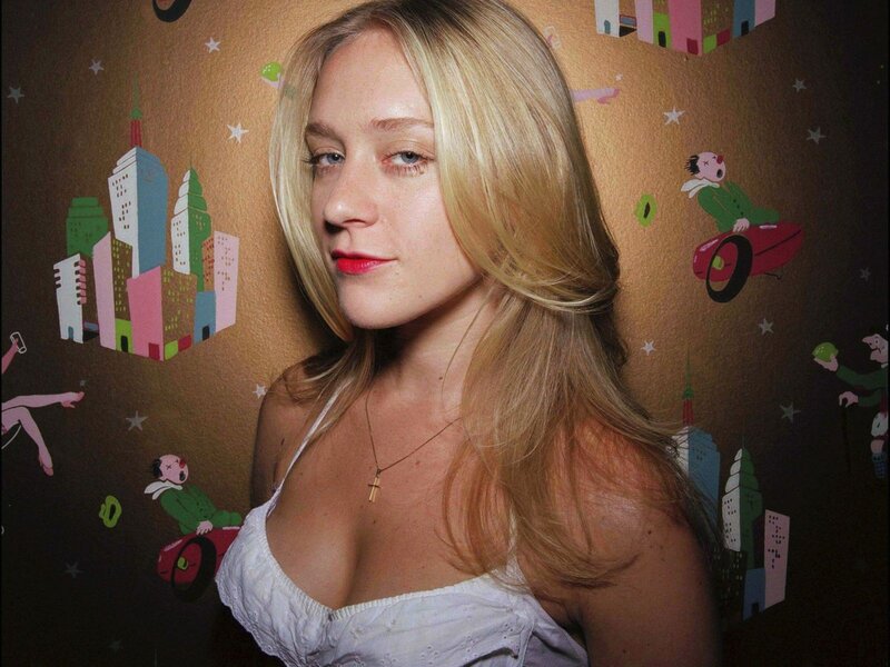 woman in white top