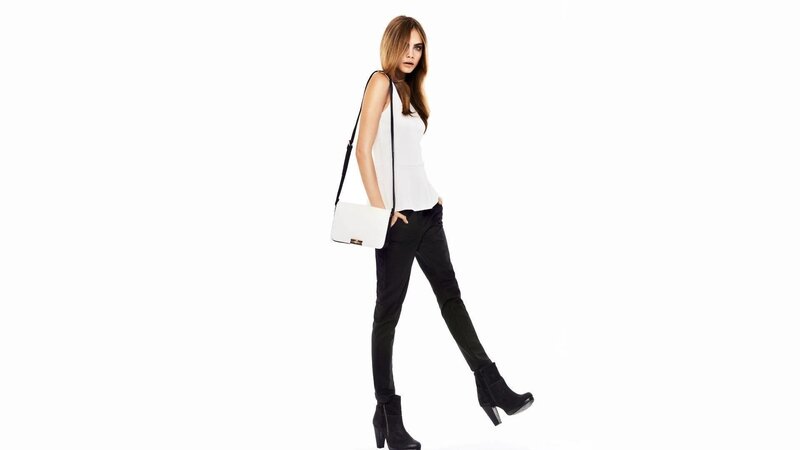 woman in white top and black pants