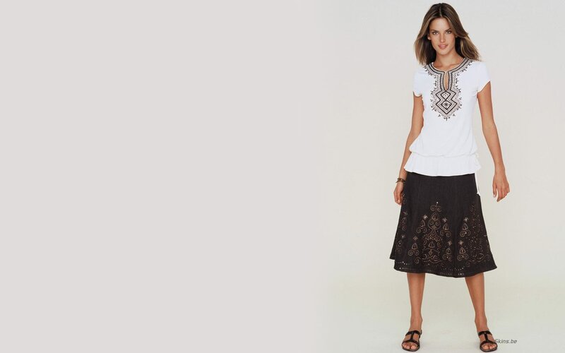 woman in white top and black skirt
