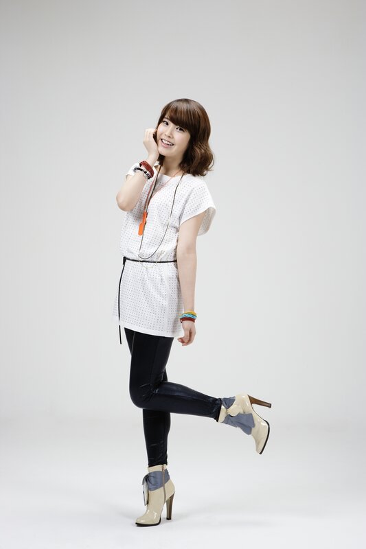 woman in white top and boots