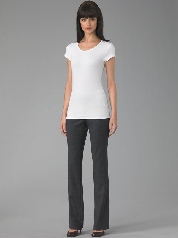 woman in white top and dark pants