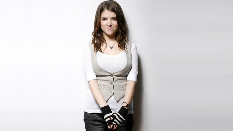 woman in white top and vest
