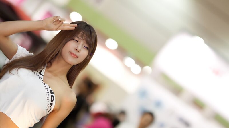 woman in white top at event
