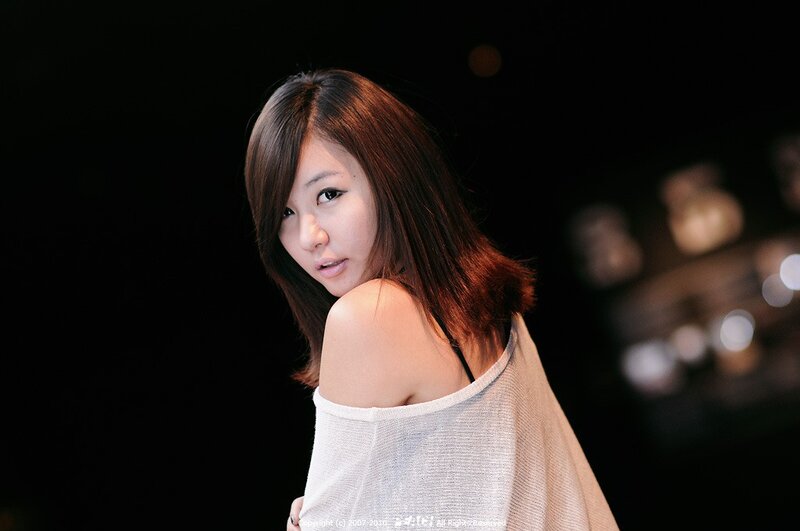Woman in White Top — Dramatic, Night, Photograph, Hair