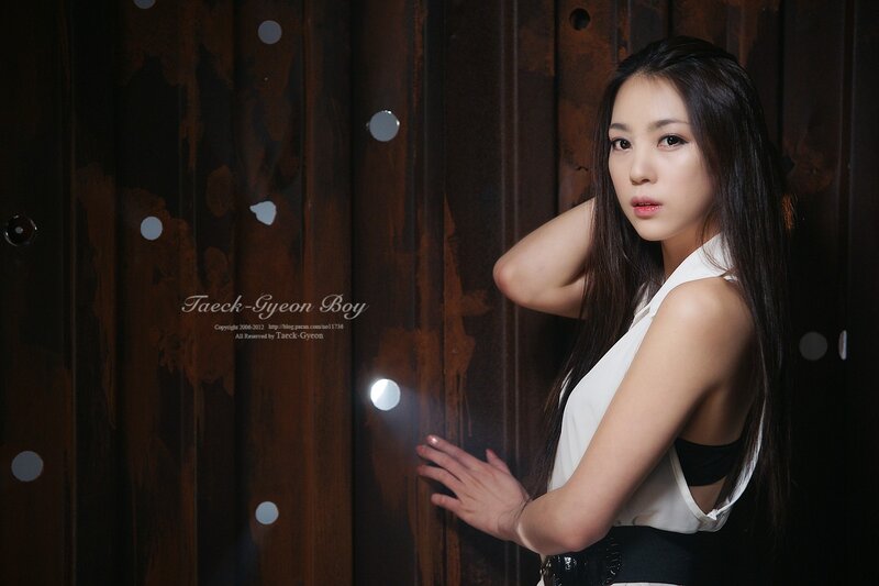 Woman in White Top — Dramatic, Photograph, Wooden Wall