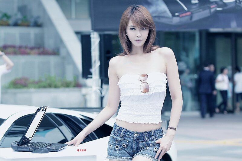 Woman in White Top — Neutral, Afternoon, Photograph, Laptop