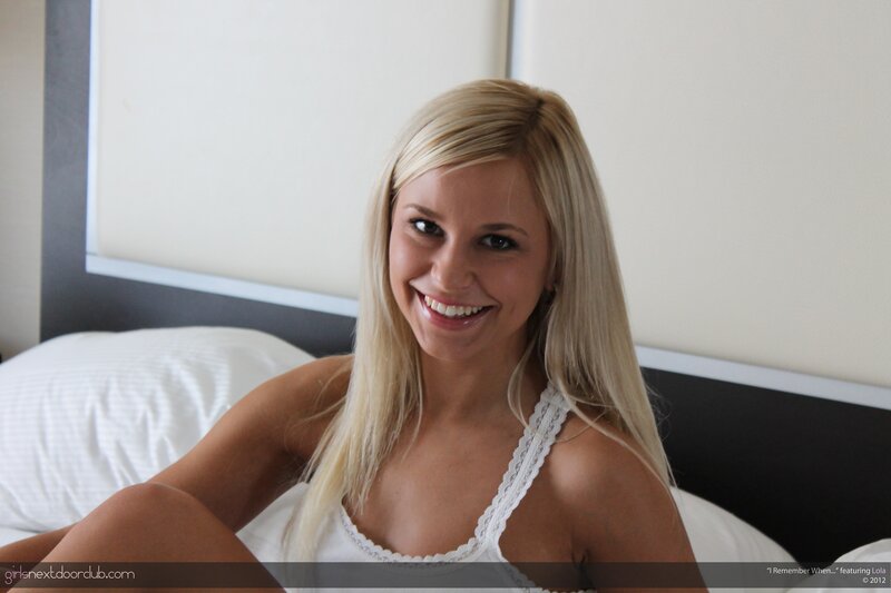 woman in white top on bed