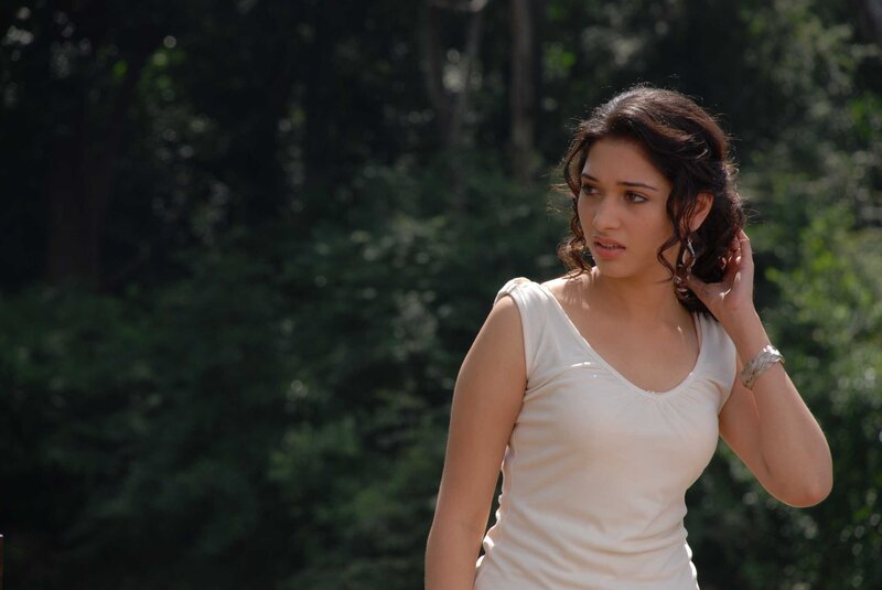 woman in white top outdoors