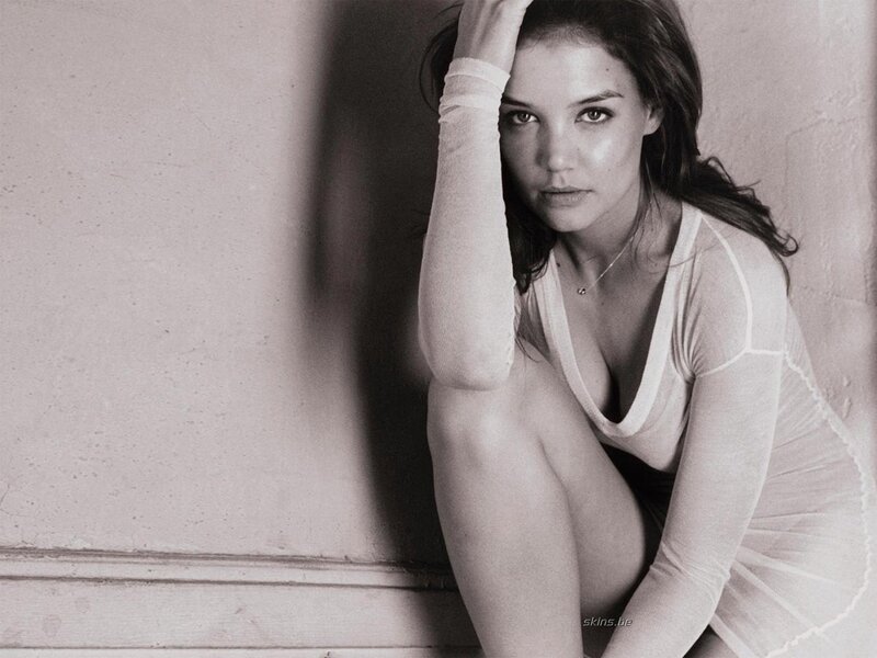 woman in white top sitting
