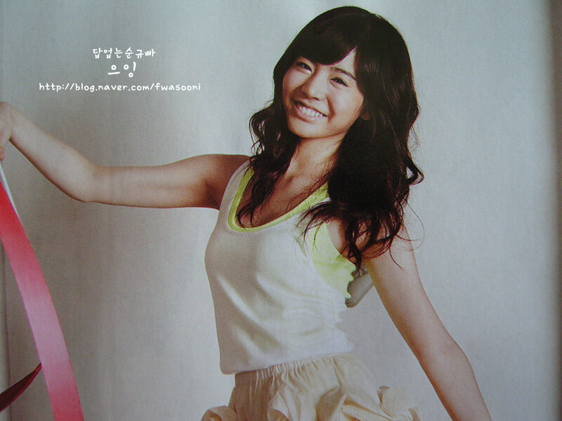 woman in white top smiling