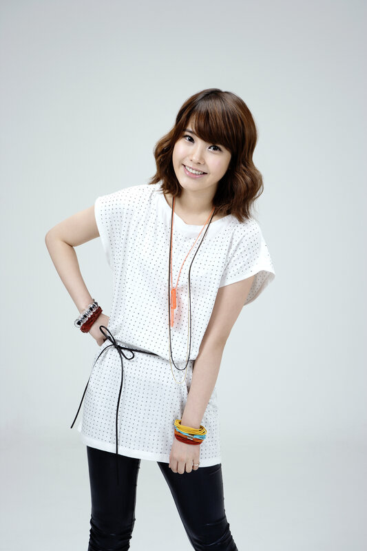 woman in white top smiling