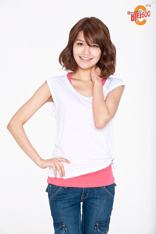 woman in white top smiling