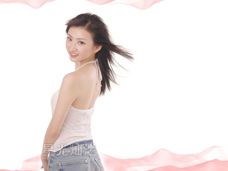 woman in white top smiling