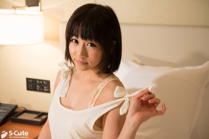 woman in white top with bows