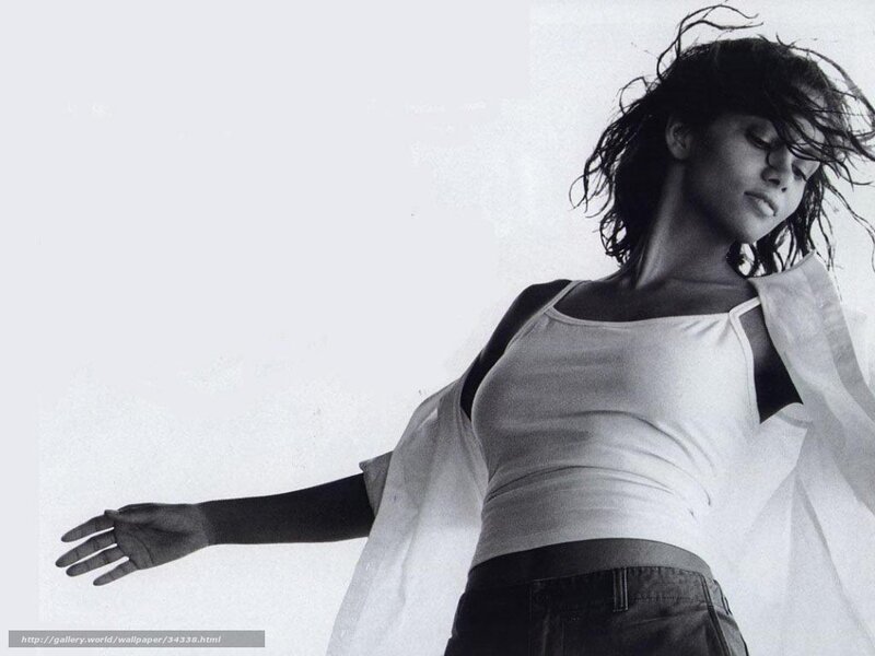 woman in white top with flowing hair
