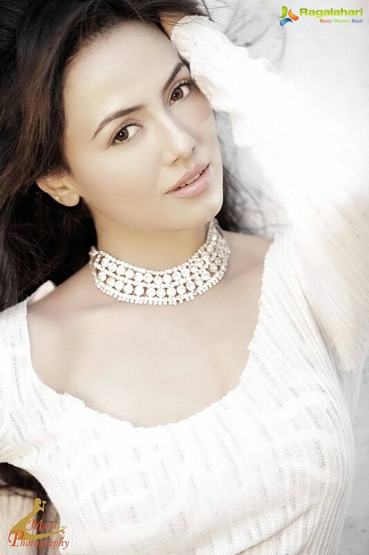 woman in white top with necklace