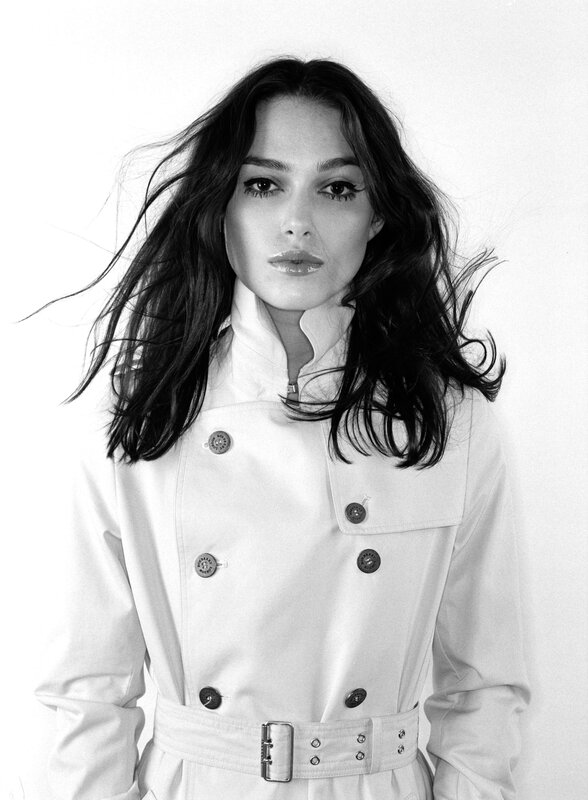 woman in white trench coat