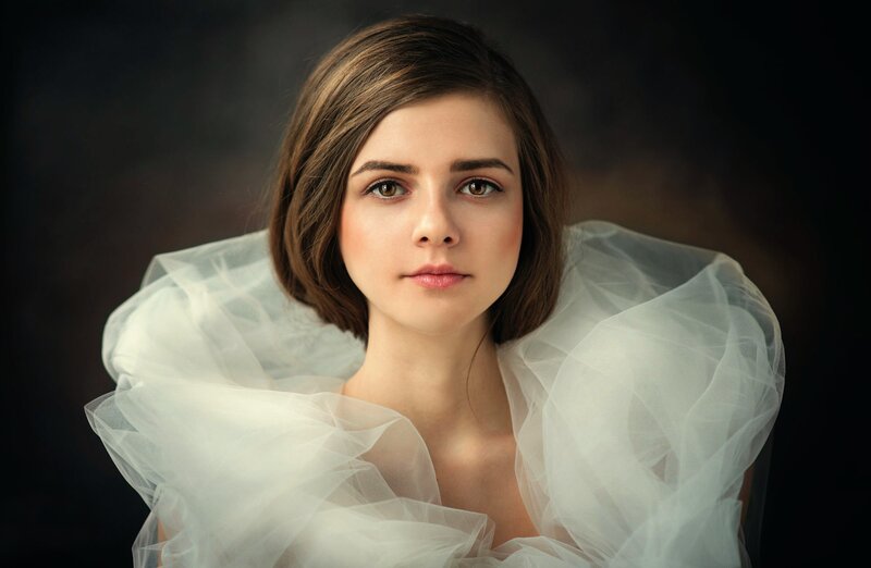 Woman in White Tulle Dress — Dramatic