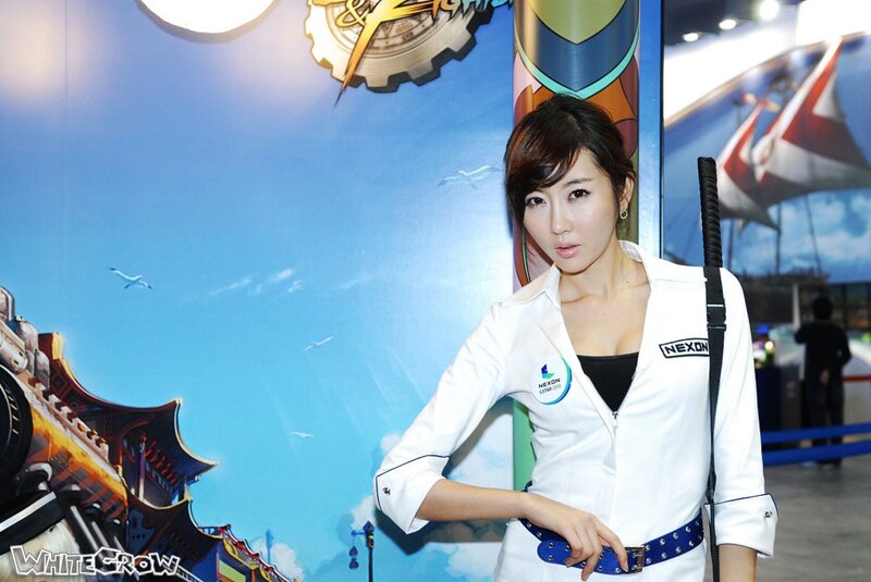 Woman in white uniform at event