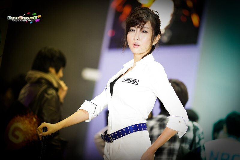 Woman in white uniform at event