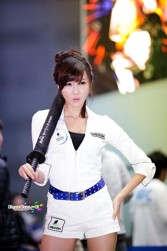 Woman in white uniform at event