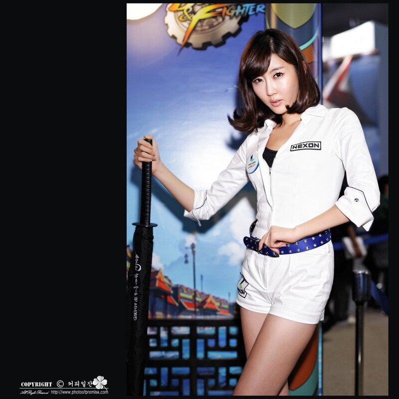 woman in white uniform holding sword