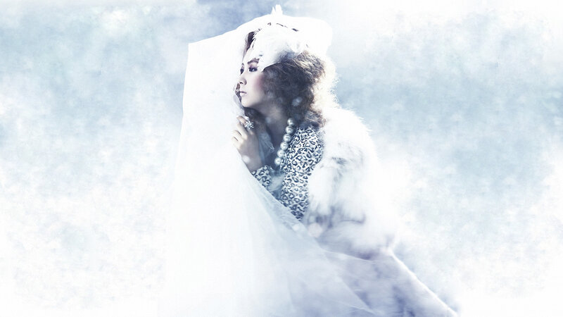 woman in white veil and fur